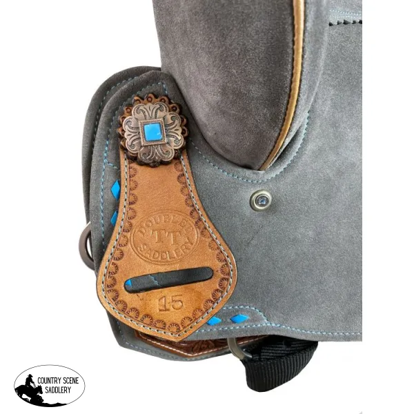 15" Double T Gray Suede Barrel Style Saddle With Teal Buckstitching.